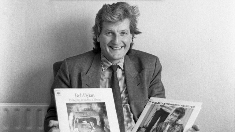 Bob Willis, English cricketer who played for Surrey, Warwickshire, and England, portrait holding Bob Dylan album , United Kingdom, 1990. (Photo by Martyn Goodacre/Getty Images)