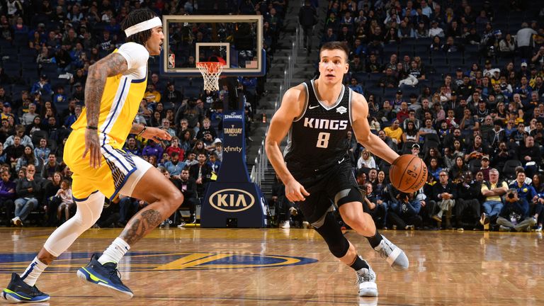 Bogdan Bogdanovic of the Sacramento Kings drives to the basket against the Golden State Warriors