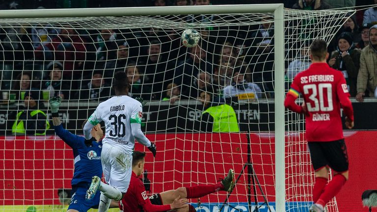 Breel Embolo scored twice to help send Gladbach to the top of the Bundesliga 