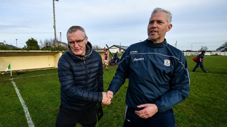 Brian Lohan and Shane O'Neill shake hands after the match