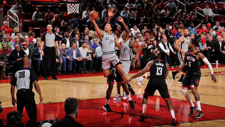 Bryn Forbes of the San Antonio Spurs drives to the basket against the Houston Rockets
