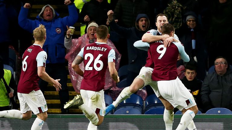 Chris Wood of Burnley celebrates with teammates after scoring his sides first goal during the Premier League match between Burnley FC and Newcastle United at Turf Moor on December 14, 2019 in Burnley, United Kingdom