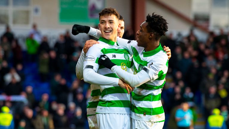 Celtic's Mikey Johnston celebrates with Jeremy Frimpong after scoring to make it 4-1 during the Ladbrokes Premiership match between Ross County and Celtic at the Global Energy Stadium