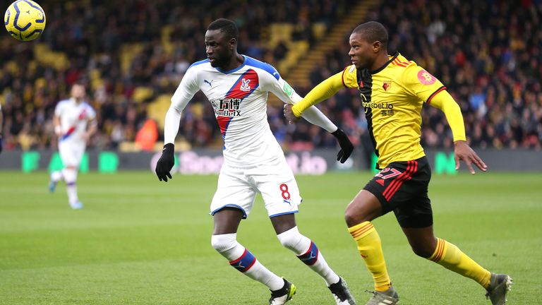 Cheikhou Kouyate and Christian Kabasele in action at Vicarage Road