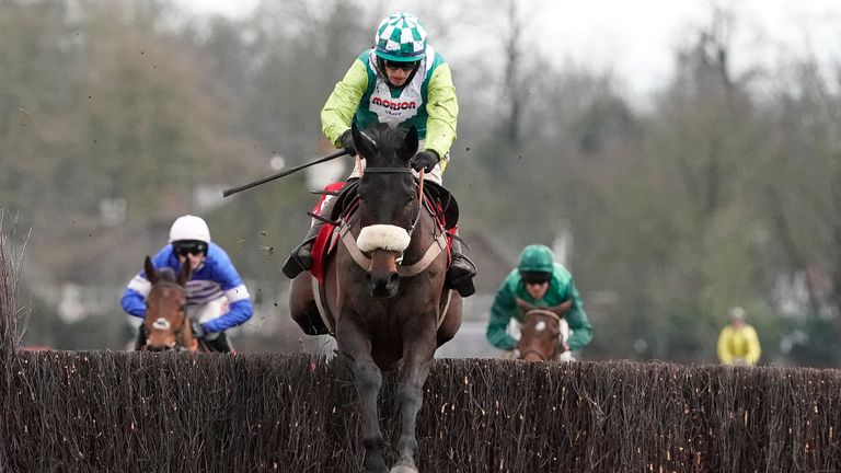 Clan Des Obeaux, ridden by Sam Twiston-Davies, clears the last to win The Ladbrokes King George VI Chase at Kempton Park