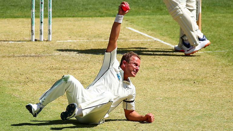 New Zealand's Neil Wagner caught David Warner off his own bowling in the first Test against Australia at Perth