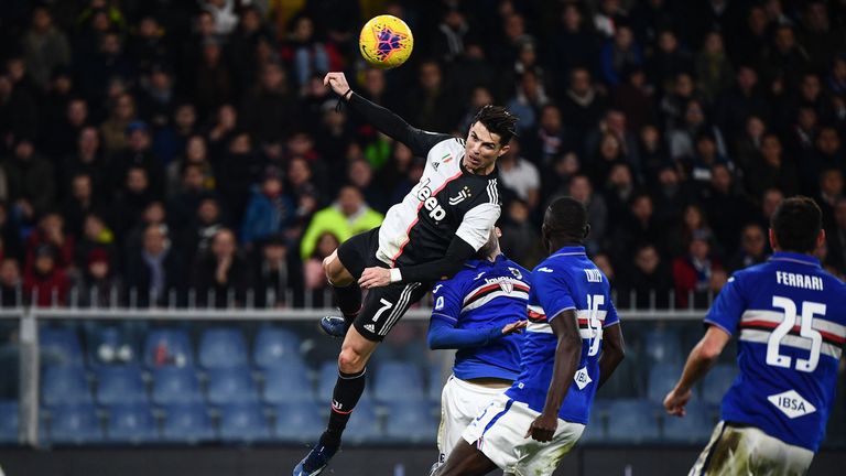 Cristiano Ronaldo rises above Sampdoria shirts to score what proved the matchwinning goal