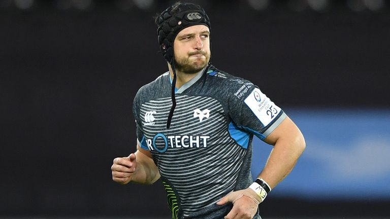 Ospreys player Dan Evans leaves the field after being sent off in the first minute of the game during the Heineken Champions Cup Round 3 match between Ospreys and Racing 92 at Liberty Stadium on December 07, 2019 in Swansea, Wales.