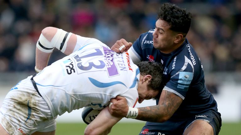 SALFORD, ENGLAND - MARCH 02: Denny Solomona (R) of Sale Sharks tackles Ian Whitten of Exeter Chiefs during the Gallagher Premiership Rugby match between Sale Sharks and Exeter Chiefs at AJ Bell Stadium on March 2, 2019 in Salford, United Kingdom. (Photo by Nigel Roddis/Getty Images)