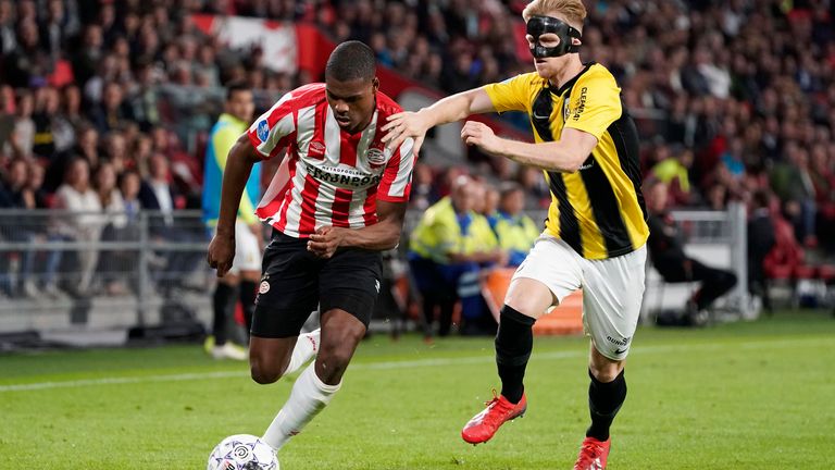 PSV's Denzel Dumfries takes on Vitesse's Max Clark