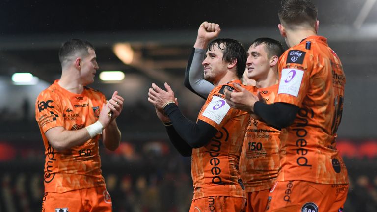 NEWPORT, WALES - DECEMBER 13: The Dragons side celebrate at the final whistle during the European Rugby Challenge Cup Round 4 match between Dragons Rugby and Worcester Warriors at Rodney Parade on December 13, 2019 in Newport, Wales. (Photo by Harry Trump/Getty Images)