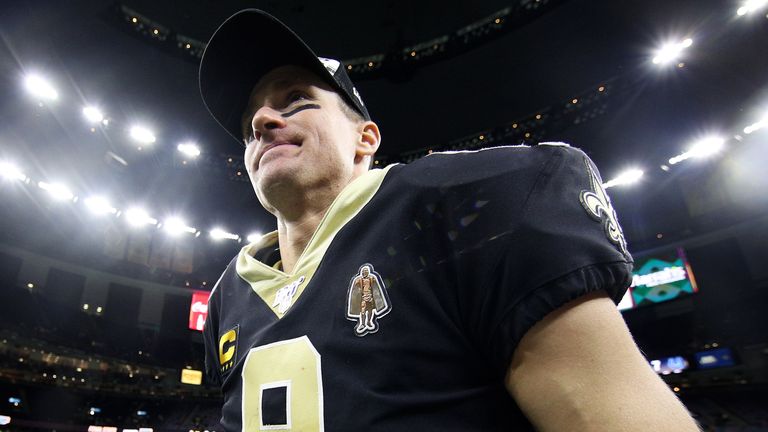 Drew Brees of the New Orleans Saints walks off the field after 34-7 win over the Indianapolis Colts