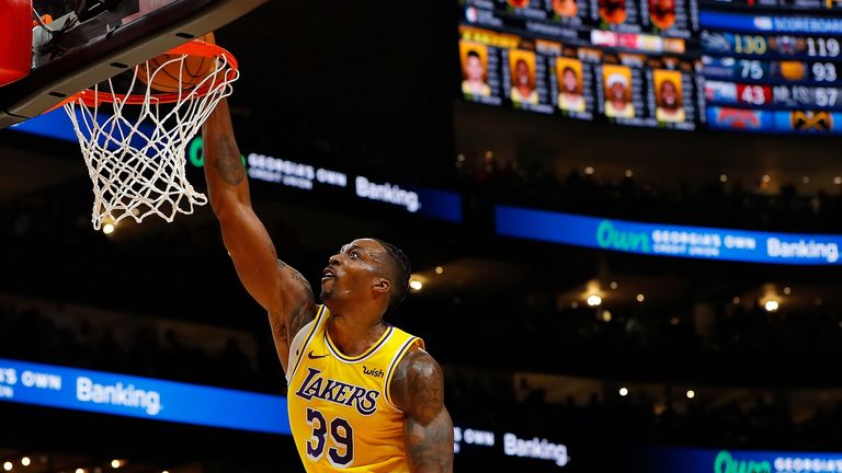 Dwight Howard of the Los Angeles Lakers dunks against the Atlanta Hawks