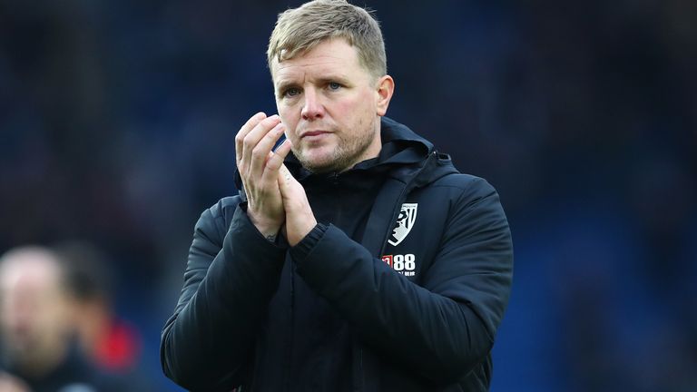 Eddie Howe applauds the travelling Bournemouth fans after defeat at Brighton