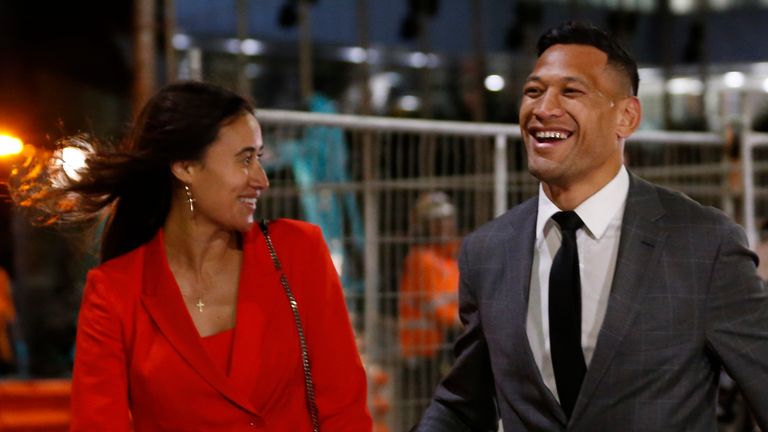 Folau is all smiles as he arrives with his wife Maria for a meeting with Rugby Australia officials 