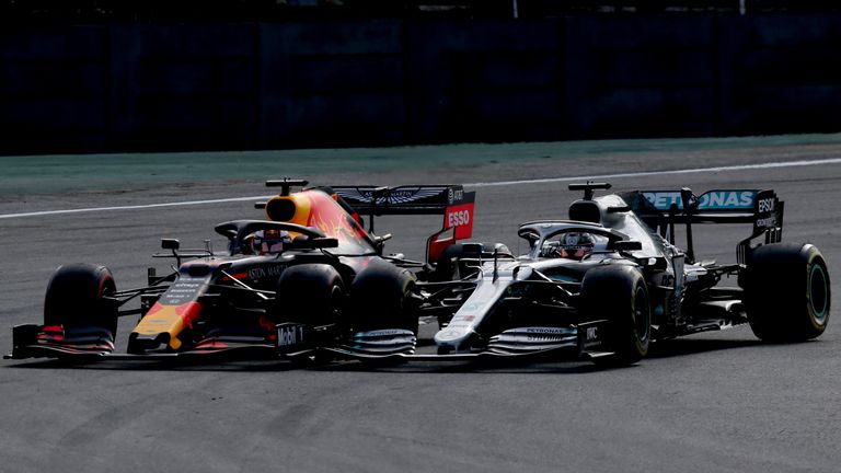 Max Verstappen overtakes Lewis Hamilton during the Brazilian Grand Prix