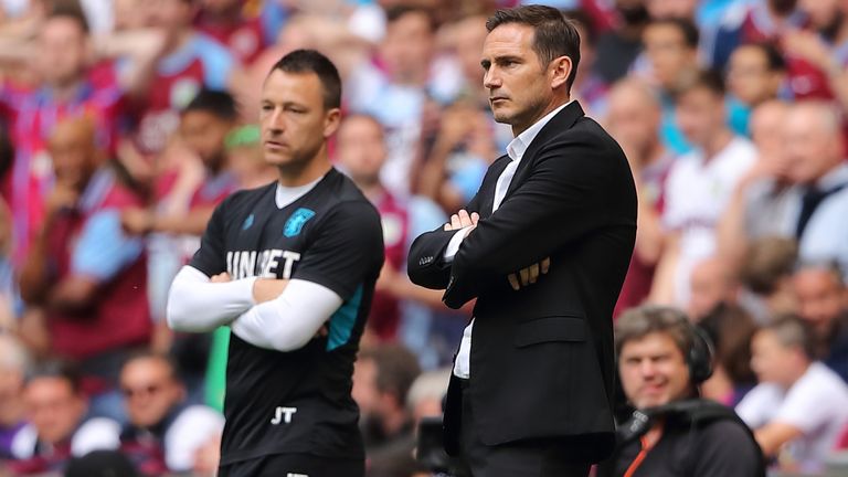 John Terry the Assistant Head Coach of Aston Villa stands on the touchline with Derby County manager \ head coach Frank Lampard the Sky Bet Championship Play-off Final match between Aston Villa and Derby County at Wembley Stadium on May 27, 2019 in London, United Kingdom. 