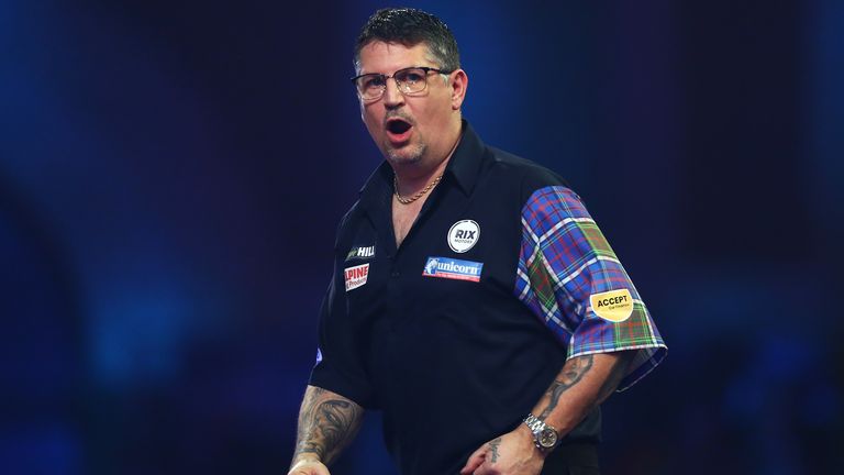 Gary Anderson of Scotland celebrates during his fourth round match against Nathan Aspinall of England on Day 12 of the 2020 William Hill World Darts Championship at Alexandra Palace on December 27, 2019 in London, England.