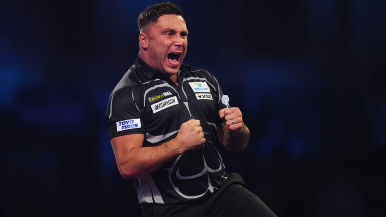 Gerwyn Price of Wales celebrates after winning the first set against Simon Whitlock of Australia in his Fourth Round match during Day Thirteen of the 2020 William Hill World Darts Championship at Alexandra Palace on December 28, 2019 in London, England.