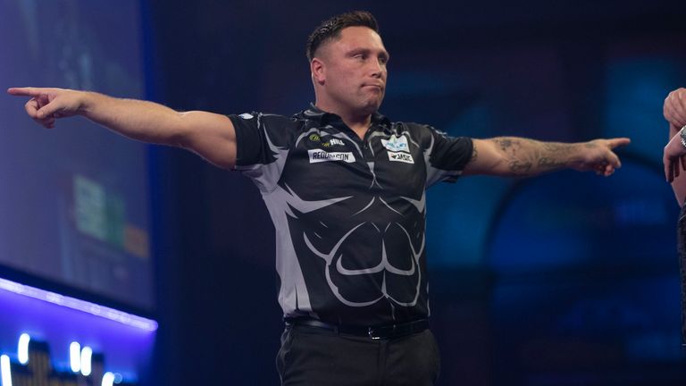 Gerwyn Price celebrates after reaching his first World Championship semi-final