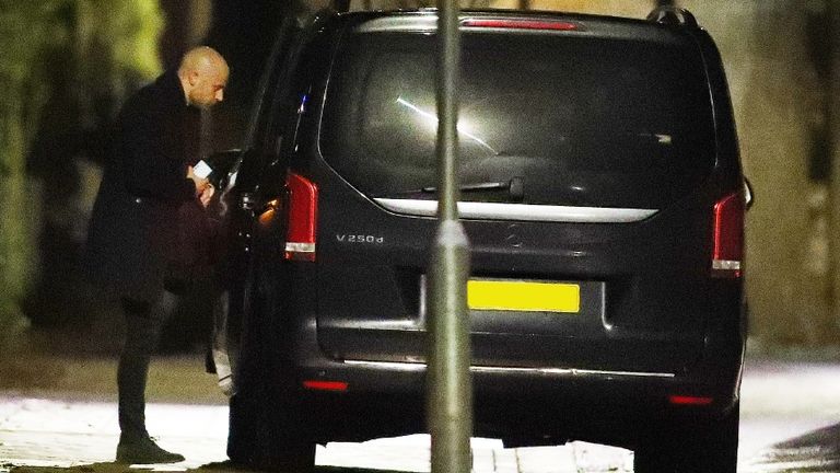 Arsenal's lawyer Huss Fahmy is pictured leaving Mikel Arteta's house