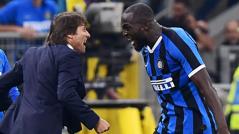 Inter Milan's Belgian forward Romelu Lukaku (R) celebrates with Inter Milan's Italian head coach Antonio Conte after scoring during the Italian Serie A football match AC Milan vs Inter Milan on September 21, 2019 at the San Siro stadium in Milan. (Photo by Miguel MEDINA / AFP) (Photo credit should read MIGUEL MEDINA/AFP via Getty Images)