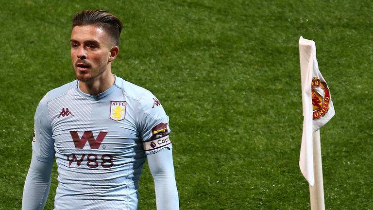 Jack Grealish of Aston Villa celebrates scoring their first goal during the Premier League match between Manchester United and Aston Villa