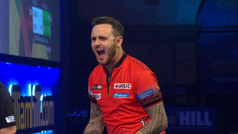 Joe Cullen celebrates a 116 checkout