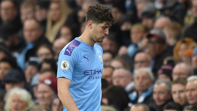 John Stones of Manchester City leaves the pitch due to injury during the Premier League match between Manchester City and Manchester United at Etihad Stadium on December 07, 2019 in Manchester, United Kingdom. (P