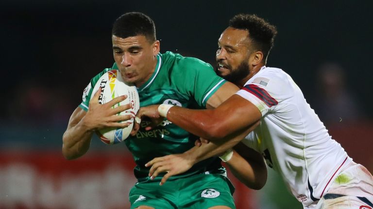 DUBAI, UNITED ARAB EMIRATES - DECEMBER 05: Jordan Conroy of Ireland is tackled by Maceo Brown of USA during the match between Ireland and Unites States on Day One of the HSBC World Rugby Sevens Series - Dubai at The Sevens Stadium on December 05, 2019 in Dubai, United Arab Emirates. (Photo by Francois Nel/Getty Images)