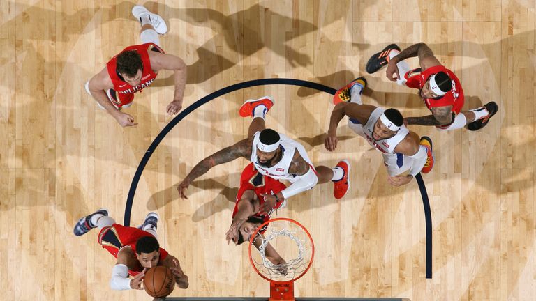 Josh Hart of the New Orleans Pelicans grabs the rebound against the Detroit Pistons