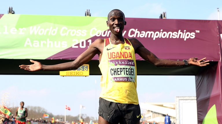 Joshua Cheptegei celebrates after winning the 2019 World Cross Championships in Denmark