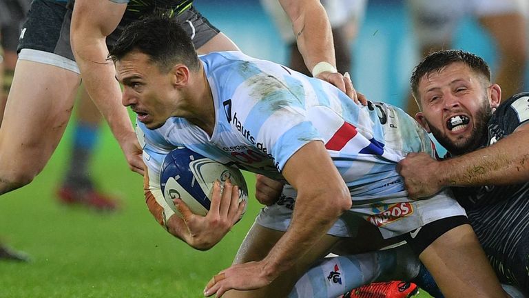 Racing 92's Argentinian wing Juan Imhoff (C) is tackled during the European Rugby Champions Cup group stage pool 4 match between Ospreys and Racing 92 at Liberty Stadium in Swansea, south Wales on December 7, 2019. (Photo by DANIEL LEAL-OLIVAS / AFP) (Photo by DANIEL LEAL-OLIVAS/AFP via Getty Images)