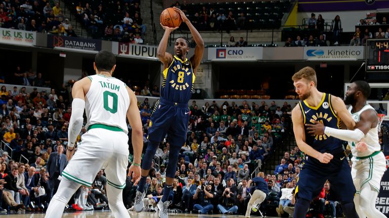 Justin Holiday of the Indiana Pacers shoots the ball against the Boston Celtics 