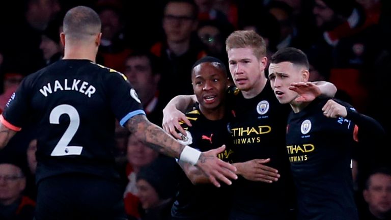 Kevin De Bruyne celebrates scoring for Manchester City against Arsenal