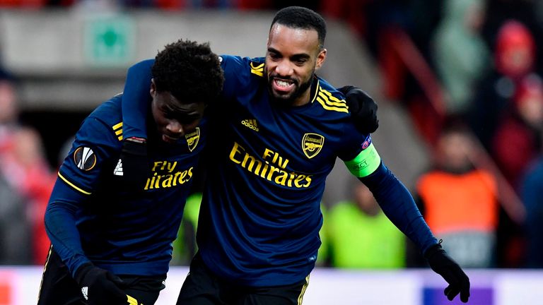 Alexandre Lacazette and Bukayo Saka scored as Arsenal came from two goals down to draw 2-2 in Liege