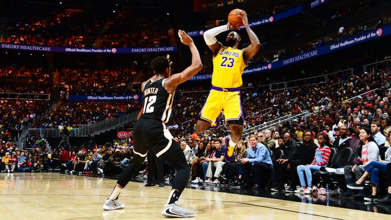 LeBron James of the Los Angeles Lakers shoots the ball against the Atlanta Hawks