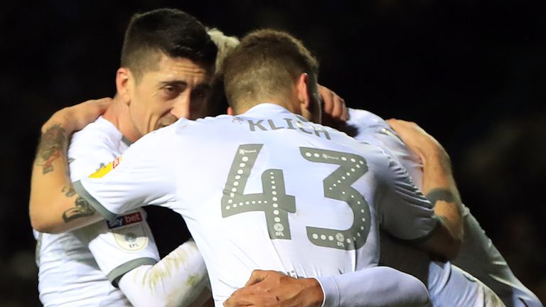 Leeds United player celebrate after Hull City's Jordy de Wijs scores an own goal during the Sky Bet Championship match at Elland Road, Leeds. PA Photo. Picture date: Tuesday December 10, 2019. See PA story SOCCER Leeds. Photo credit should read: Simon Cooper/PA Wire. RESTRICTIONS: EDITORIAL USE ONLY No use with unauthorised audio, video, data, fixture lists, club/league logos or "live" services. Online in-match use limited to 120 images, no video emulation. No use in betting, games or single club/league/player publications.