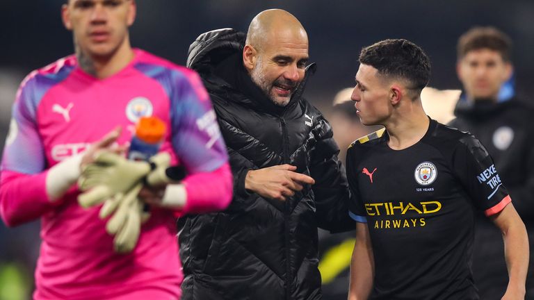Pep Guardiola speaks to Phil Foden after the recent win over Burnley