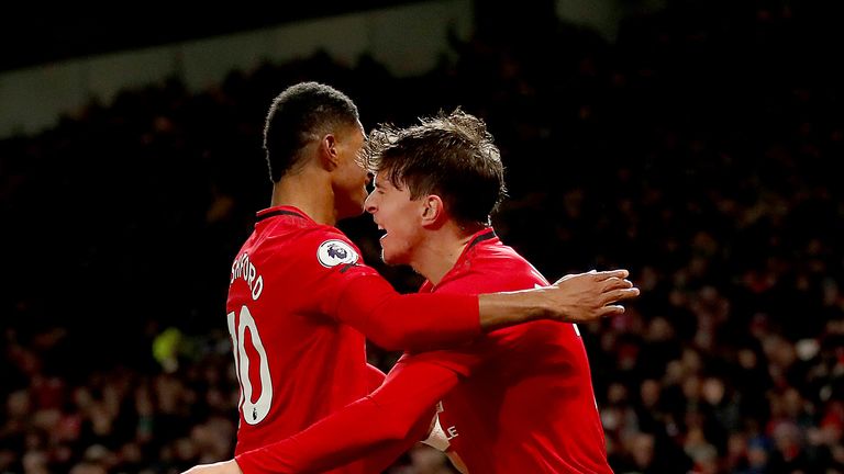 Manchester United's Victor Lindelof (right) celebrates scoring his side's second goal against Aston Villa with Marcus Rashford 