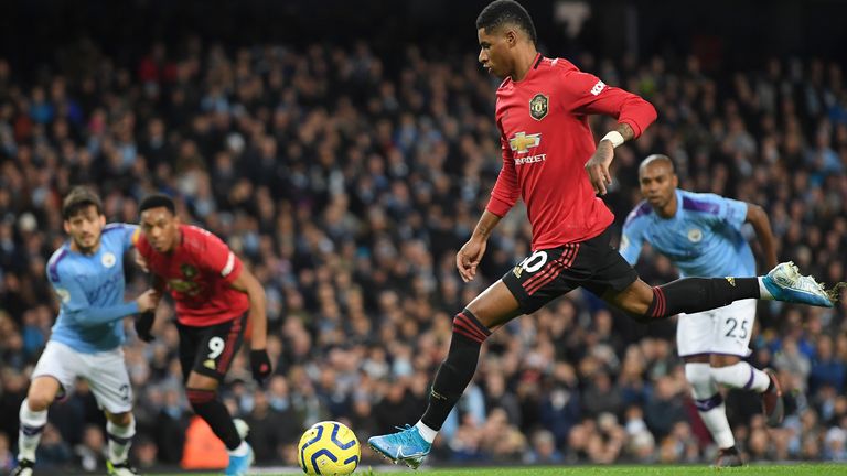 Marcus Rashford gives Manchester United the lead from the penalty spot