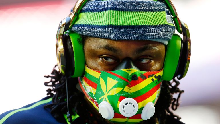 GLENDALE, AZ - FEBRUARY 01: Marshawn Lynch #24 of the Seattle Seahawks stands on the field prior to Super Bowl XLIX at University of Phoenix Stadium on February 1, 2015 in Glendale, Arizona. (Photo by Tom Pennington/Getty Images)