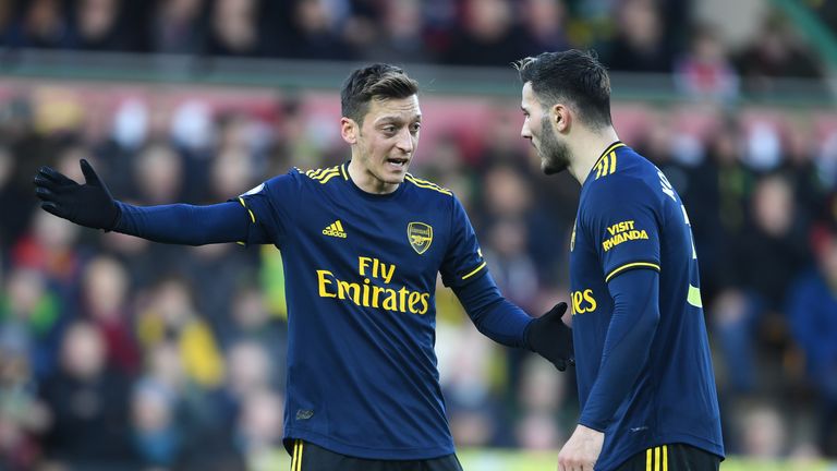Mesut Ozil and Saed Kolasinac in deep discussing during Arsenal's 2-2 draw with Norwich