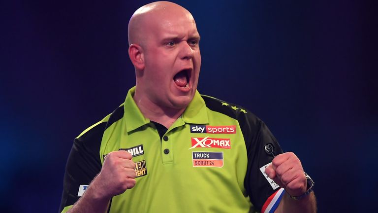 Michael van Gerwen celebrates during the Semi-Final match between Michael van Gerwen and Nathan Aspinall on Day 15 of the 2020 William Hill World Darts Championship at Alexandra Palace on December 30, 2019 in London, England