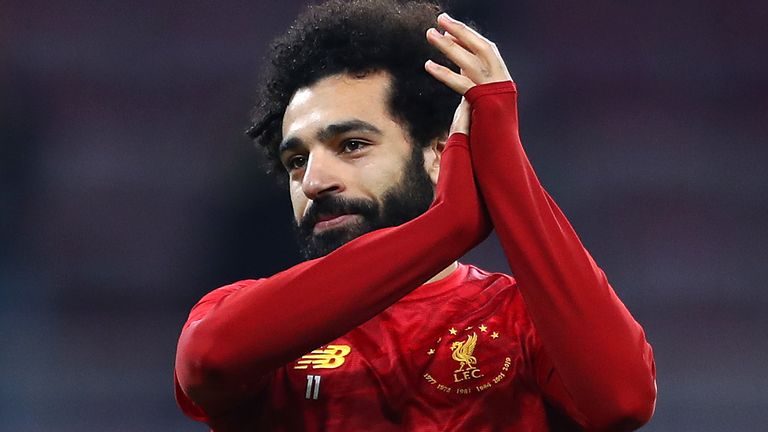 Mo Salah warms up ahead of Liverpool's Club World Cup semi-final