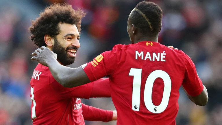 Mohamed Salah celebrates his goal with Sadio Mane