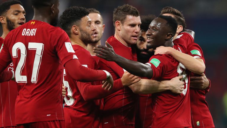 DOHA, QATAR - DECEMBER 18: Naby Keita of Liverpool celebrates with his team mates after scoring a goal to make it 0-1 during the FIFA Club World Cup Qatar 2019 Semi Final match between Monterrey and Liverpool FC at Khalifa International Stadium on December 18, 2019 in Doha, Qatar. (Photo by Matthew Ashton - AMA/Getty Images)
