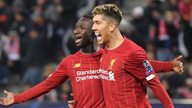 Naby Keita celebrates his opening goal with Roberto Firmino at Red Bull Salzburg