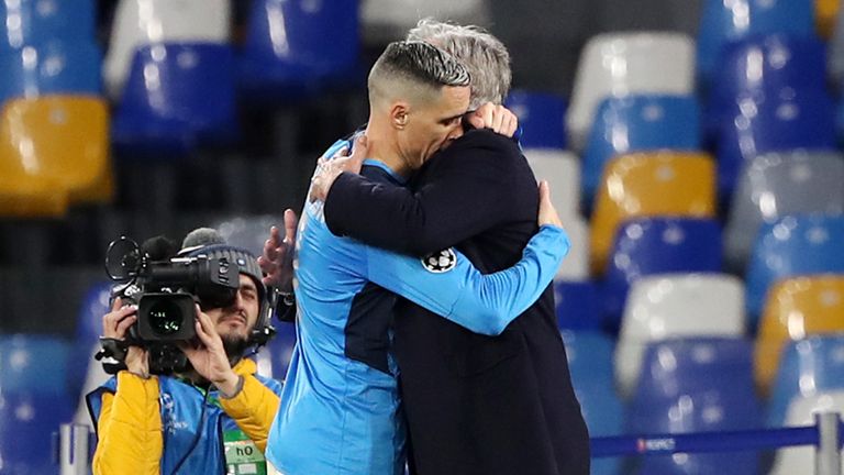Ancelotti embraces Jose Callejon at the final whistle against Genk