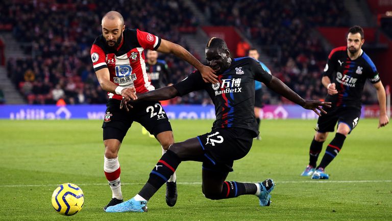 Nathan Redmond is tackled by Mamadou Sakho
